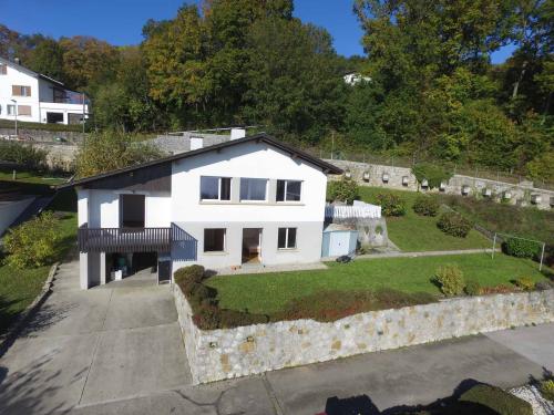 Élégante maison individuelle de 6,5 pièces avec terrasse et vue imprenable