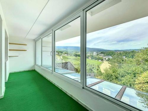 Triplex de 3.5 pièces avec terrasses et studio indépendant