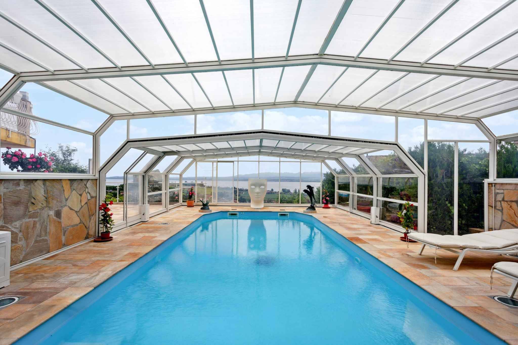 Villa familiale avec panorama unique sur le lac de Neuchâtel et les Alpes